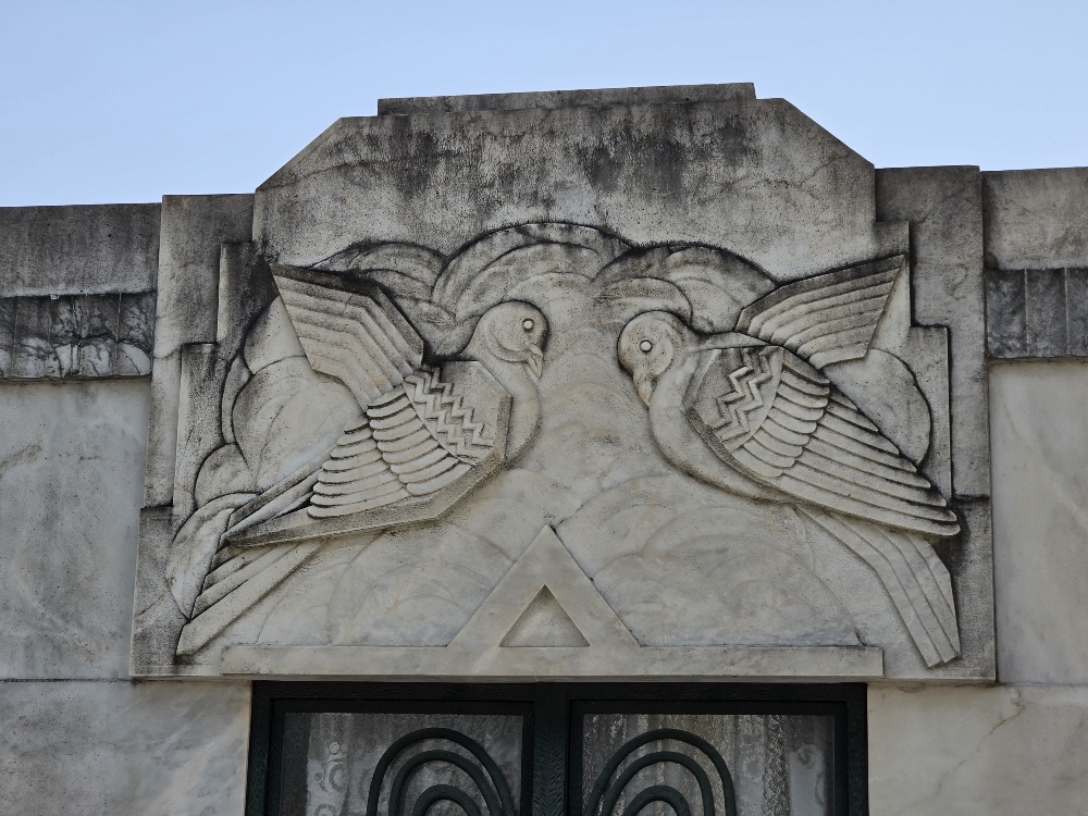 Stone relief of two doves